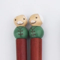 Japanese style wooden chopsticks featuring cute old man doll heads in green outfits - Grandpa