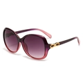 Purple gradient oval sunglasses for women featuring elegant gold bow metal accents - Gradient Purple Frame Gray Lens