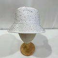 Close-up of sparkling rhinestones on a white cotton bucket hat for sun protection - M (56-58cm) / White