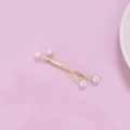 Detail of two gold hairpins with white pearls on a pink background for women's styling - Smooth Pearl Style(C6207)