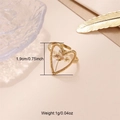 Detailed view of heart-shaped dried flower resin ring with 1.9cm height dimensions - Gold - Heart Purple & Yellow Flower