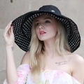 Women's black beach sun hat with polka dot lining and wide brim for UV protection - M (56-58cm) / Black Outer Black and White Polka Dot Lining