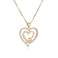 Elegant gold double heart necklace with sparkling cubic zirconia on a delicate cross chain - Nested Solid Double Heart