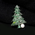 Green Christmas tree brooch with white rhinestones and a pearl on dark fabric background - Christmas Tree Style (YNCP3408)