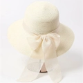 Detailed view of beige woven straw hat featuring a large elegant chiffon bow ribbon - Adjustable / White