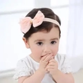 Pink toddler headband with large lace bow and gold star accent on a young model - FD Five-pointed Star Pink