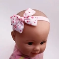 Pink and white polka dot bow headband with elastic lace for baby girls and toddlers - Bubble Bow Pink