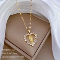 Dettaglio del ciondolo a cuore dorato Madonna con zirconi e dimensioni della catena - Stile Cuore Vergine Maria Oro