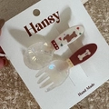 Macro view of cute dog-patterned spoon and bone fork hair clips on beige fleece - 2-Pack Cartoon - Bone & Dog Utensils