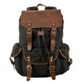 Vintage black waxed canvas backpack with dark brown leather flap and bronze buckle accents - Black
