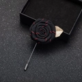 Handmade black fabric rose boutonniere with red stitching and a gold leaf in a gift box - Black