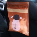 Orange cartoon koala disposable car trash bag attached to the back of a black seat - 15pcs / Brown Bear