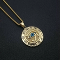 Gouden Oog van Horus hanger van roestvrij staal met blauw detail op donkere stof - Goud Zwart Gewreven Losse Hanger