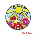 Detailed macro view of 8.1cm colorful sun and flower embroidered patch with fine stitching - Sun & Flowers