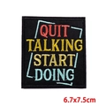 Macro detail of 'QUIT TALKING START DOING' embroidered patch with precise black border - QUIT TALKING Text