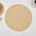 Detailed close-up of a two-tone round woven placemat with beige and white texture - Yellow & White