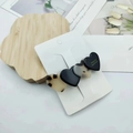 Detail of acetate heart hair clip with floral patterns on a fashion jewelry card - Black & Leopard Heart