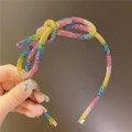 Detalle de diadema de pedrería colorida con un lazo arcoíris brillante - Lazo De Circonita Completa / Arcoíris