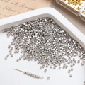 Detailed view of silver plated cube spacer beads for DIY jewelry and bracelet making - 2mm White K (10 Pcs)