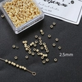 Vista detallada de cuentas espaciadoras doradas de 2,5mm para joyería DIY y artesanía - Oro de 14K 2.5mm (100 piezas)