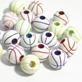 Macro shot of colorful acrylic basketball-shaped loose beads for DIY jewelry making - 12mm Basketball White Background Colorful Line