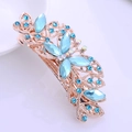 Golden flower hair clip with light blue crystals and leaf-shaped sparkling rhinestones - Lake Blue Butterfly