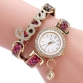 Close-up of diamond LOVE bracelet watch featuring burgundy leather band and gold pendant - Black (QS2512-017-04)