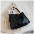 Large black tote bag in glossy soft leather with long shoulder straps for daily use - Black
