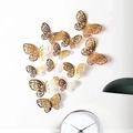 Juego de 12 pegatinas de pared de mariposa dorada hueca en varios tamaños para decoración hogar - Dorado