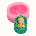Pink silicone mold with a leaf-wrapped baby fondant sculpture for DIY craft - Baby in Leaf Style