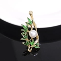 Elegant gold bamboo brooch with green enamel leaves and large white pearl accent - Bamboo Green Enamel