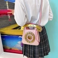 Pink retro telephone crossbody bag with gold sequins and realistic dial pad detail - Pink