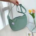 Mint green large crescent crossbody bag with cute cloud charm and adjustable strap - Green