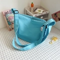 Light blue corduroy dumpling crossbody bag with cute cloud charm and adjustable strap - Blue