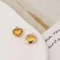 Detalle de colgantes de corazón bañados en oro con circón amarillo para joyería DIY - 10*12mm / Amarillo