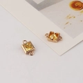 Macro view of gold-plated square zircon connectors with yellow gemstones for DIY jewelry - 8*13mm / Yellow