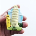 Detail of hand-held 3D resin Italy Pisa fridge magnet with relief PISA ITALY lettering - Leaning Tower of Pisa