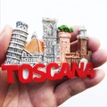 Handheld detail of a 3D resin Italy Toscana fridge magnet with Leaning Tower of Pisa - Italy Toscana Landmark