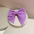 Detailed texture of purple ribbed ribbon bow hair clip on a minimalist display stand - Hair Clip / Purple