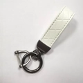 White PU leather woven keychain with dark gray zinc alloy D-ring and metal attachments - White (Gunmetal Hardware)