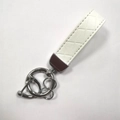 Zinc alloy keychain featuring a white diamond-embossed leather strap and silver metal rings - White (Silver Hardware)