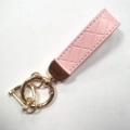 Pink leather keychain with diamond pattern and golden metal horseshoe ring hardware - Pink (Gold Hardware)