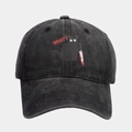 Detail shot of the funny black cat holding a knife embroidery on a washed grey baseball cap - Adjustable / Black