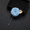 Blue fabric rose boutonniere with golden metal leaf and pink stitched texture for suits - Pale Blue