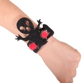 Halloween slap bracelet featuring a black sequined ghost design with red fuzzy pom-poms - Black Little Ghost