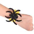 Halloween black glitter spider snap bracelet with yellow band shown on wrist - Black Spider