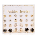Close-up of 12 pairs of gold alloy and zircon stud earrings on a display card - 12 Pairs Flower Star Zirconia Set