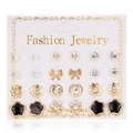 Close-up of 12-pair gold alloy earring set featuring pearls and rhinestones on card - 12 Pairs Pearl Flower Bow Zirconia