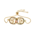 Detailed close-up of gold adjustable bracelet featuring colorful micro-pave zircon stones - Box Chain 5