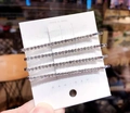 Set di quattro fermagli per capelli con strass argentati su confezione di marca coreana - Set da 4 pezzi / Argento